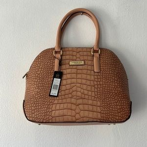 Beautiful London Fog bag with a long handle.